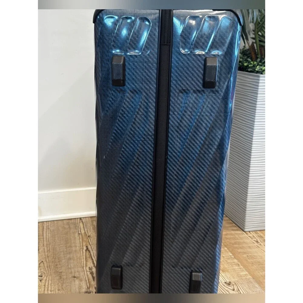 Tumi Large Expandable Checked Glossy Navy Hard-Shell Spinner Luggage suitcase